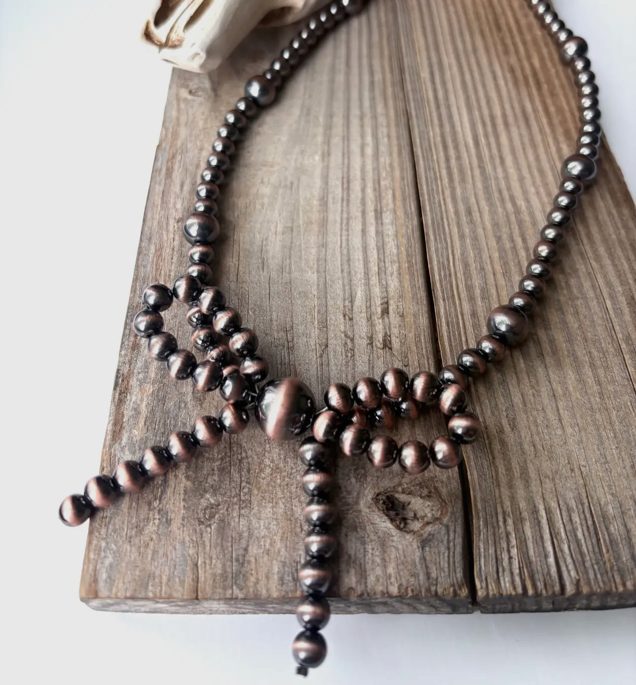 Western Navajo Pearl Bead Coquette
Bow Necklace