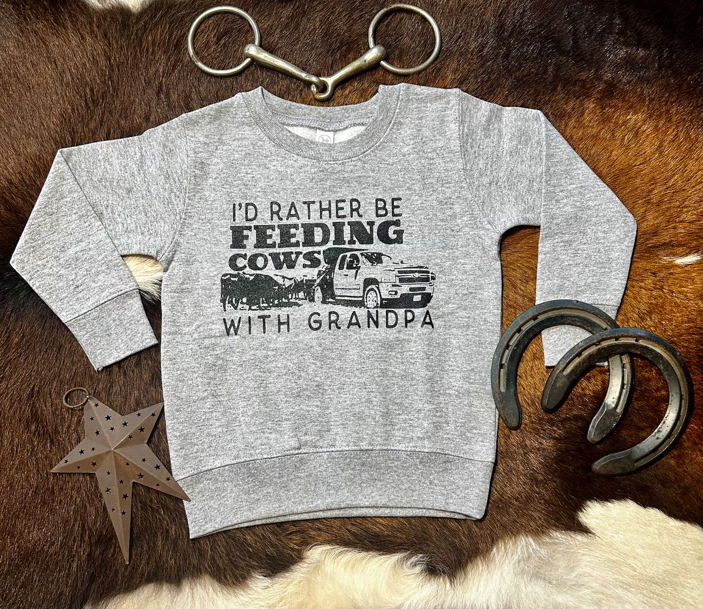 I’d rather be feeding cows with grandpa**midwinter sale** was 28.00 NOW 17.00. All sale items are final & no returns on sale items.