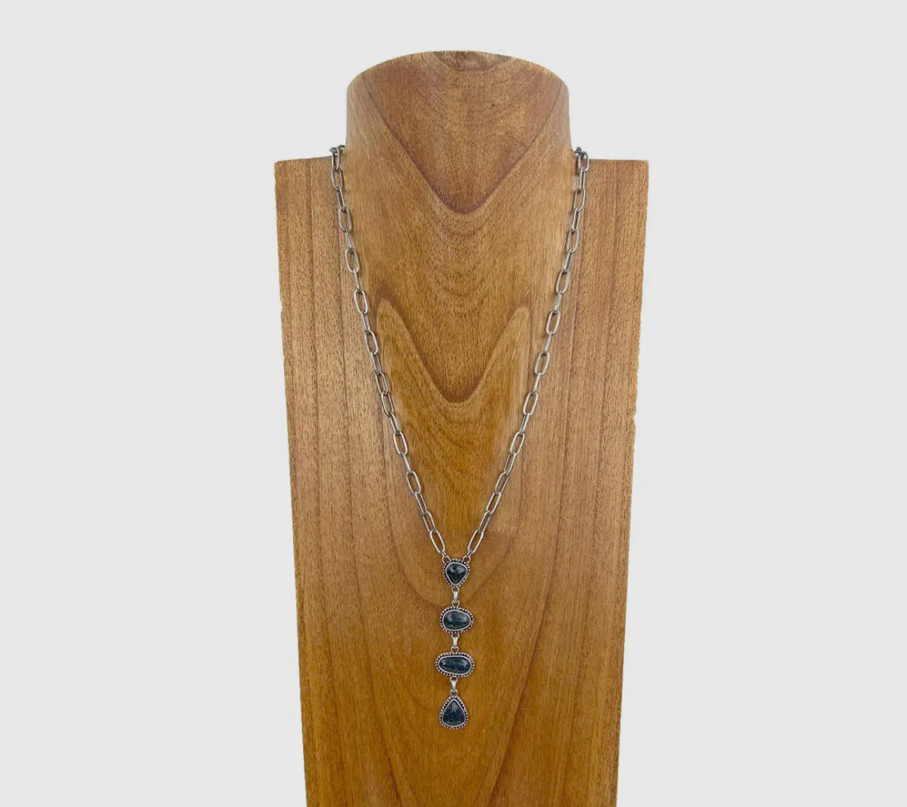 22 Inches
Silver Metal Chain with Four BLACK Turquoise Stone Teardrops Necklace