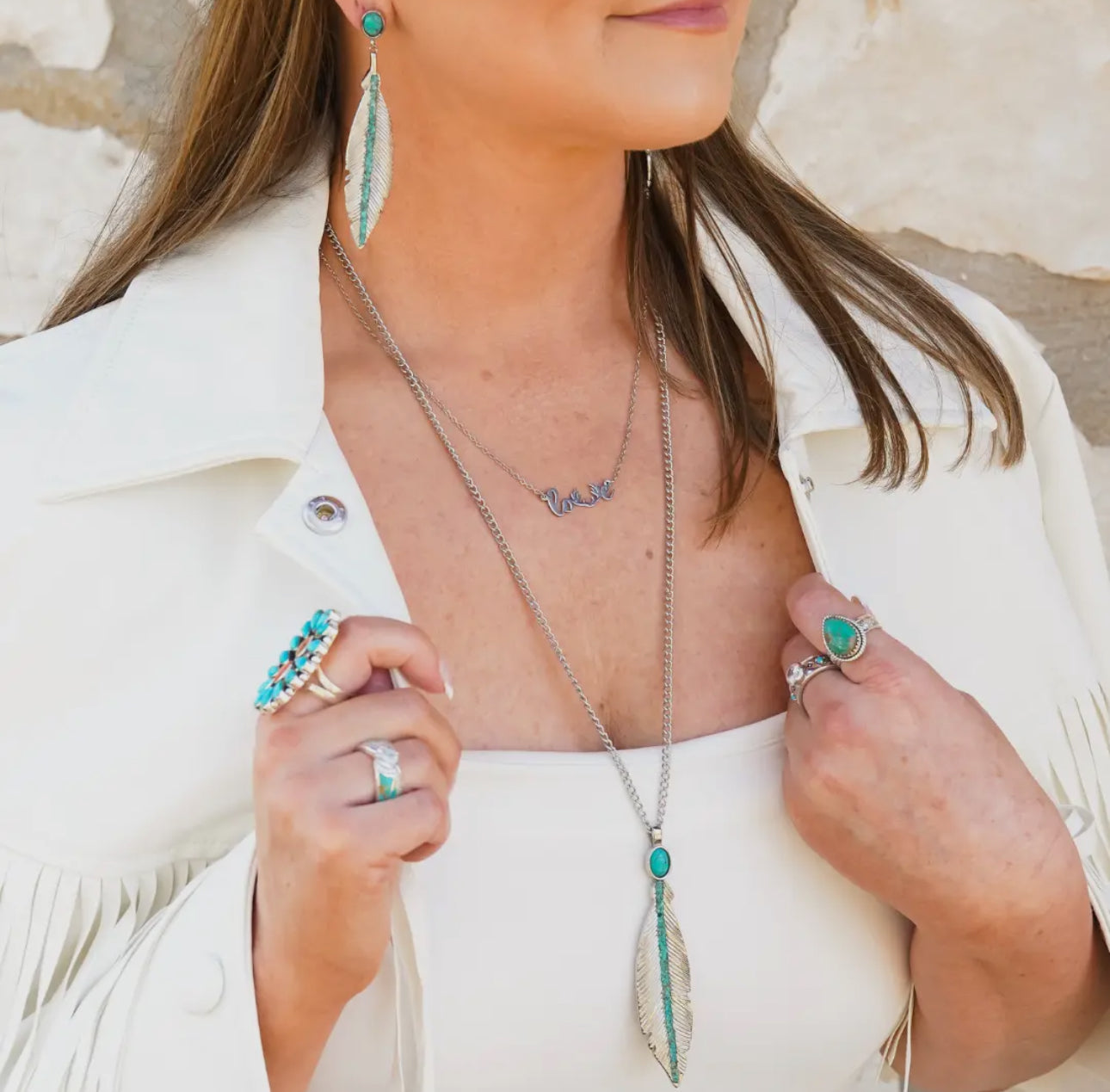 The Feather Drop Earrings. ANTLER RINGS brand.