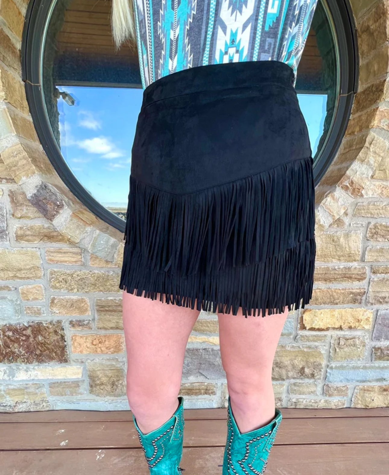 FORT WORTH FRINGE SKIRT BLACK This skirt has sewn is shorts underneath and a zipper on the side :) These skirts are so soft and comfortable!