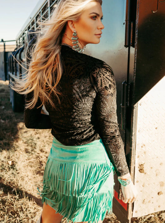 FORT WORTH FRINGE SKIRT TURQUOISE. This skirt has sewn is shorts underneath and a zipper on the side :) These skirts are so soft and comfortable!