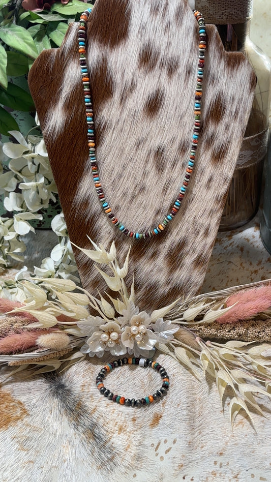 Authentic Sterling Silver Navajo Pearl Mixed Bead bracelet with multicolor Stone accents. Featuring the kingman turquoise, orange and red spiney oyster, red coral, purple spiney oyster(matching necklace available also).