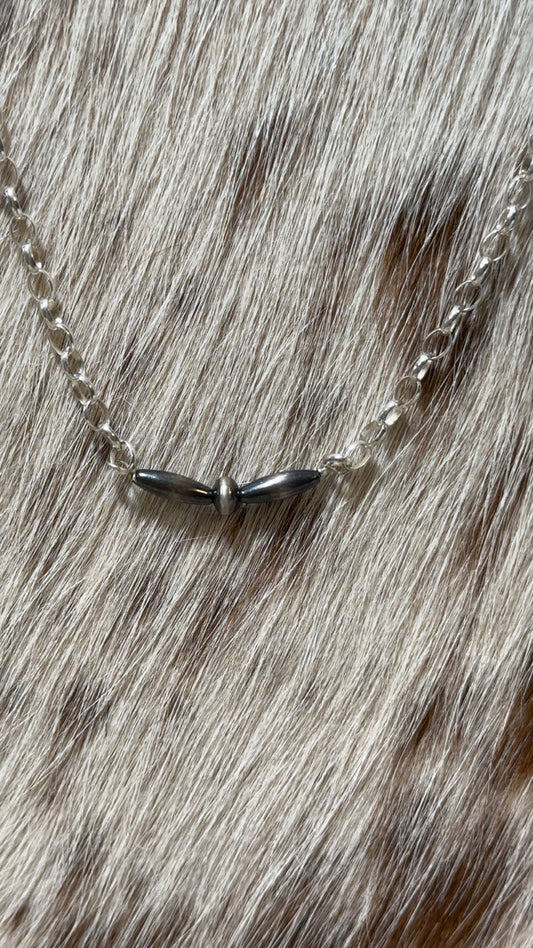 Sterling chain necklace with Navajo Pearl bead pendant.