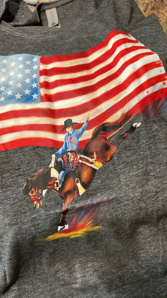 Stars Stripes & Rodeo Rides| Western
Graphic Tank **please note that it is a touch of a lighter gray than the picture* Referred to picture number two to see the color. 