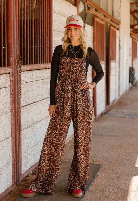 RANGE & ROAR JUMPSUIT. They a little oversized and *These have a raw hem and are able to be cut to your height* if they are too long.