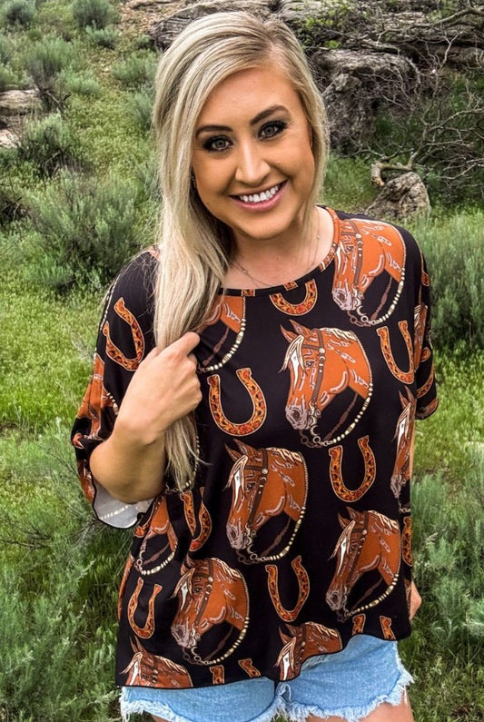 THE LUCKY HORSE SHOE TOP **sale was 33.00 NOW 18.00 All sale items are final & no returns on sale items.