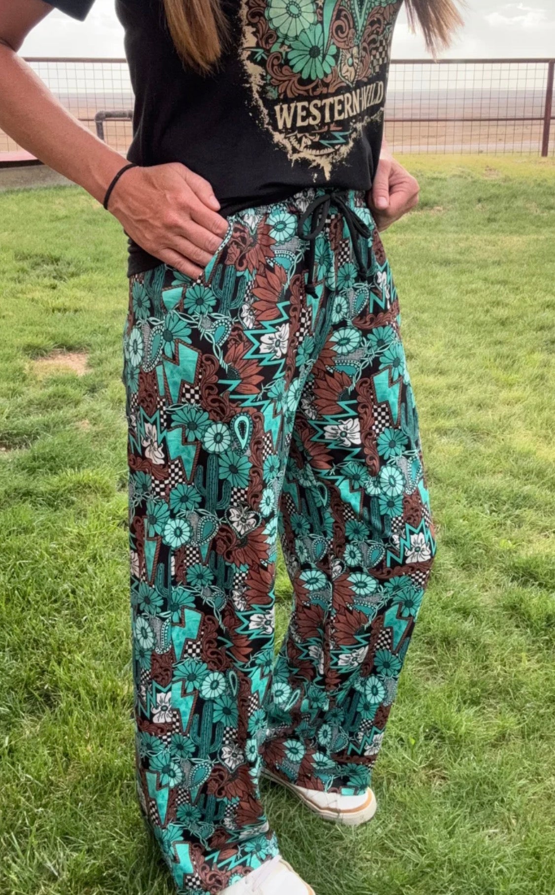 TATTOOS IN TURQUOISE PANTS