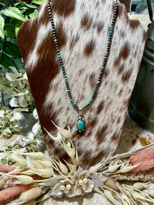 Authentic Stamped Navajo pearl and turquoise beaded necklace with a turquoise cluster pendant.
