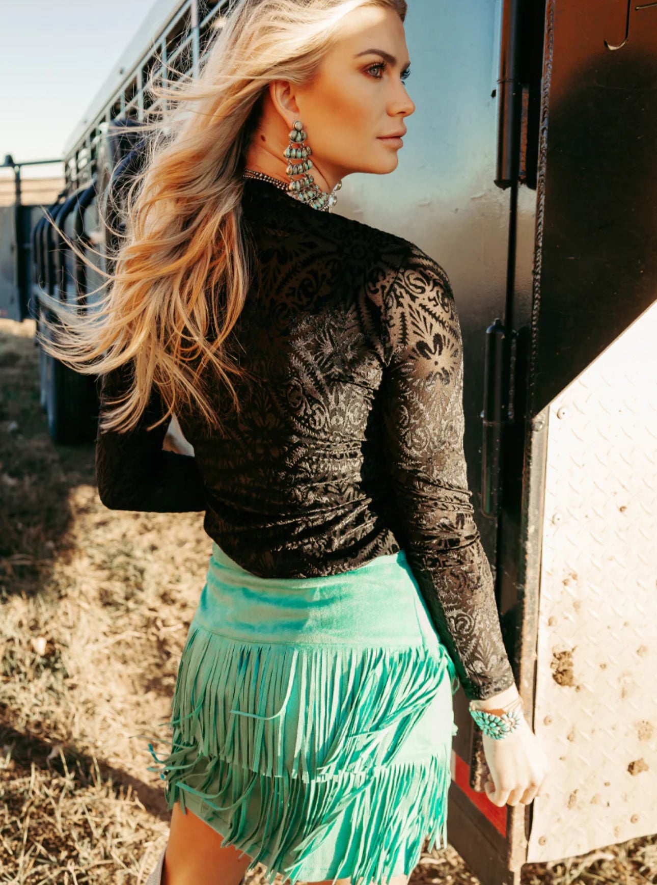 FORT WORTH FRINGE SKIRT TURQUOISE. This skirt has sewn is shorts underneath and a zipper on the side :) These skirts are so soft and comfortable!