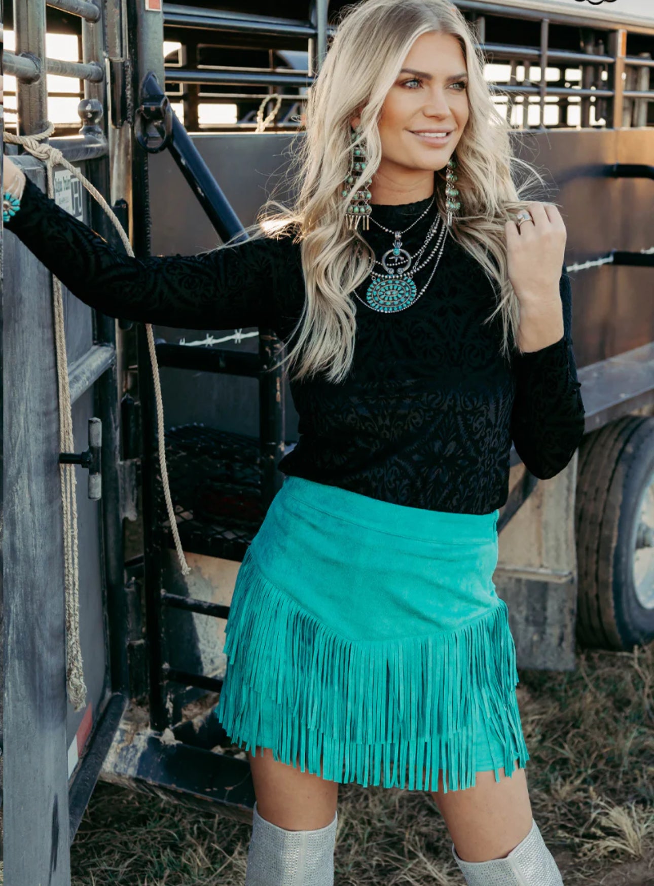 FORT WORTH FRINGE SKIRT TURQUOISE. This skirt has sewn is shorts underneath and a zipper on the side :) These skirts are so soft and comfortable!