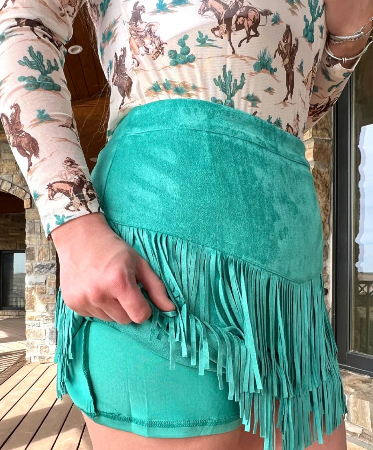 FORT WORTH FRINGE SKIRT TURQUOISE. This skirt has sewn is shorts underneath and a zipper on the side :) These skirts are so soft and comfortable!
