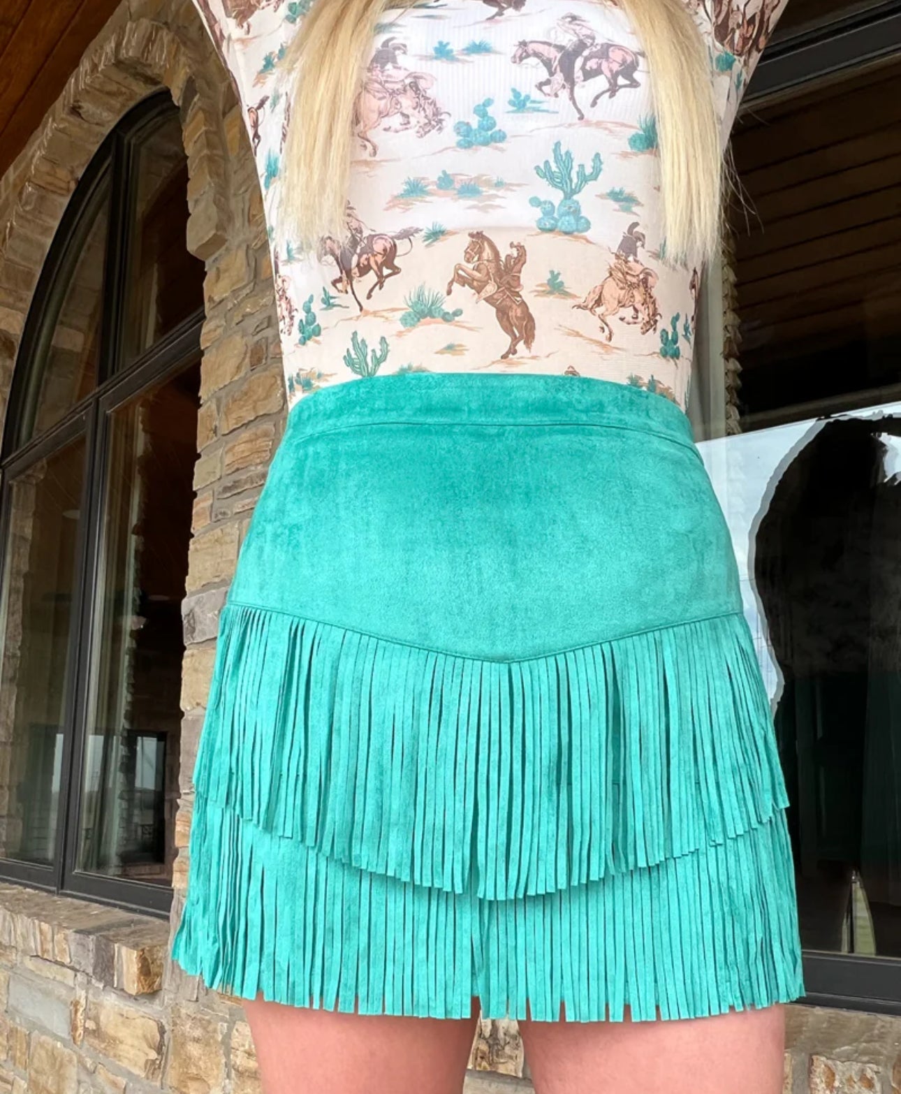 FORT WORTH FRINGE SKIRT TURQUOISE. This skirt has sewn is shorts underneath and a zipper on the side :) These skirts are so soft and comfortable!