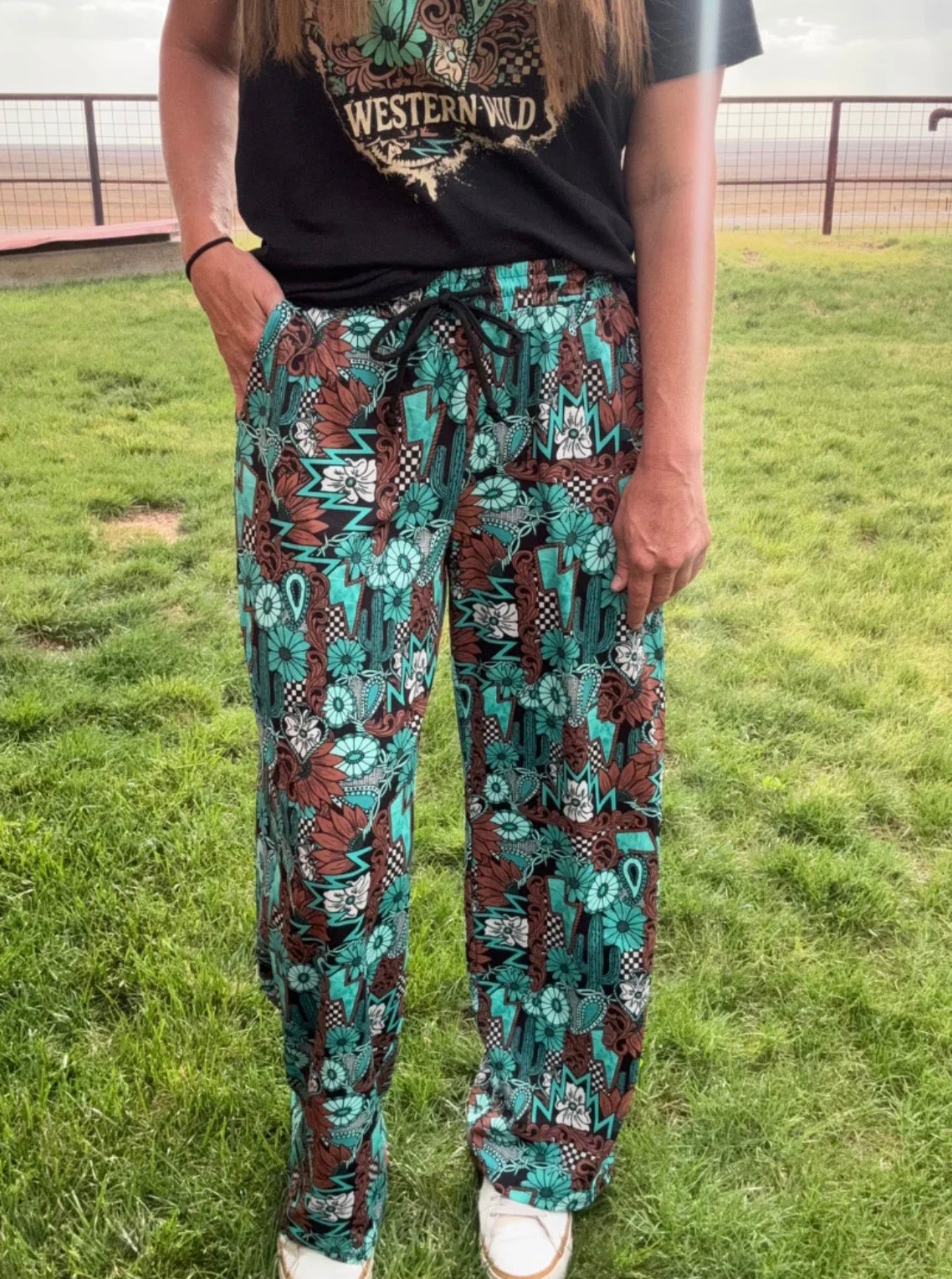 TATTOOS IN TURQUOISE PANTS