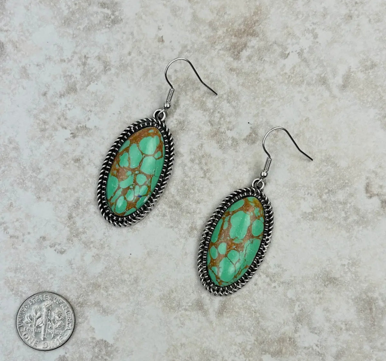 Silver Dangle Earrings with Green
Oval Stone
