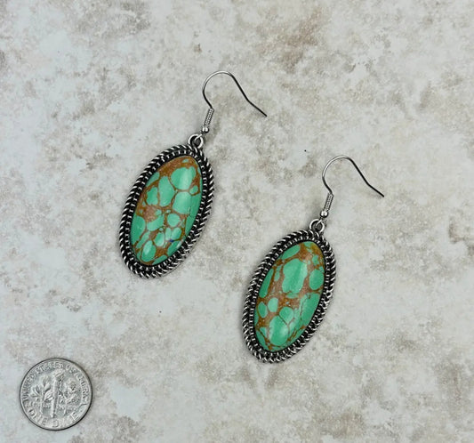 Silver Dangle Earrings with Green
Oval Stone