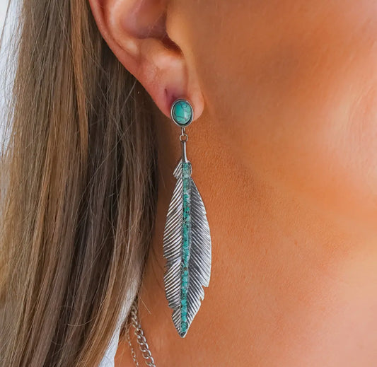 The Feather Drop Earrings. ANTLER RINGS brand.
