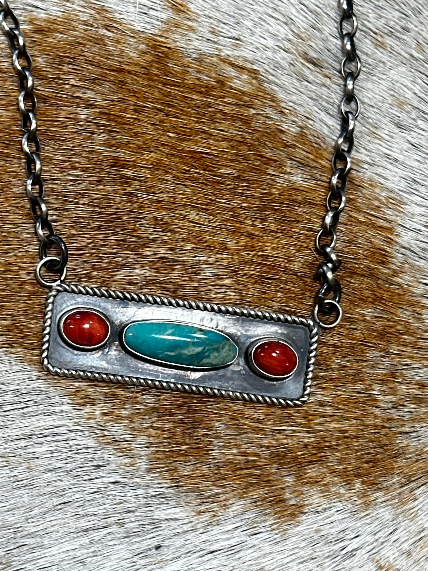 Authentic stamped bar necklace. Kingsman turquoise with red corral (the red is more orange in person)