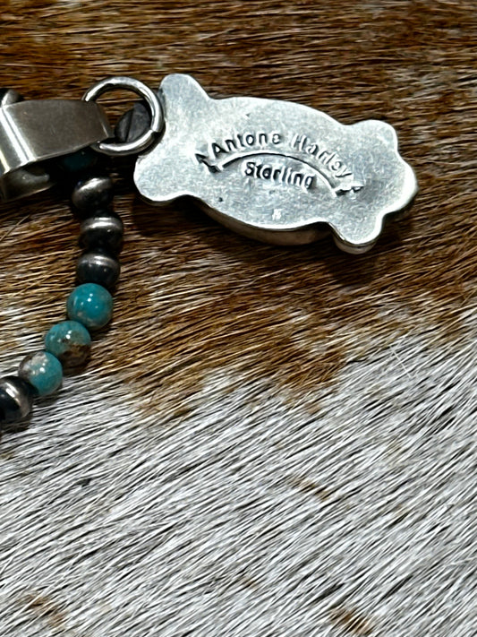 Authentic Stamped Navajo pearl and turquoise beaded necklace with a turquoise cluster pendant.