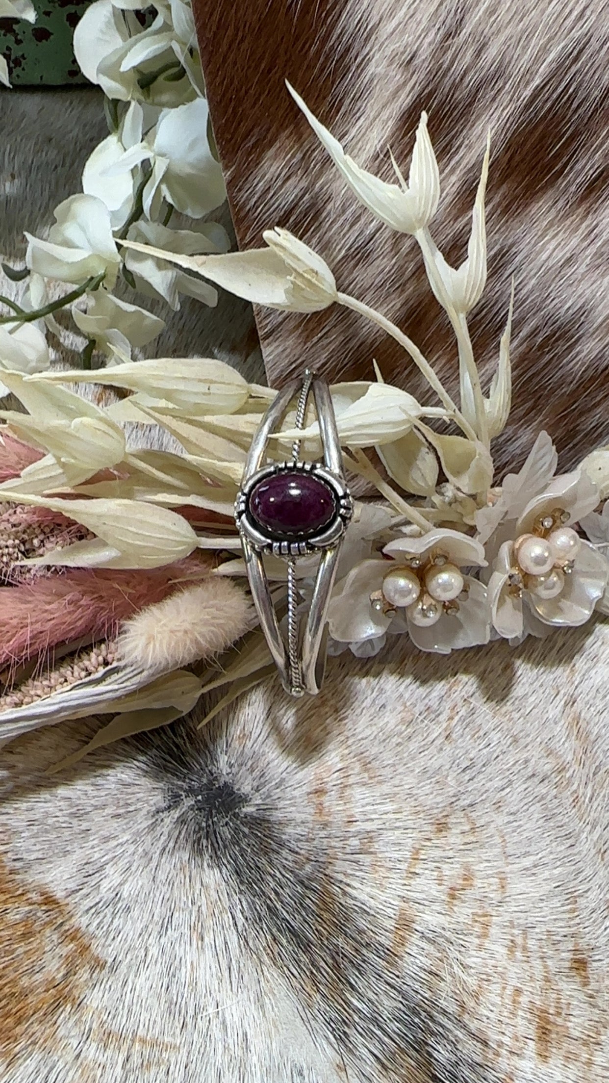 Authentic Stamped Navajo sterling silver cuff bracelet featuring a purple spiny oyster stone. 