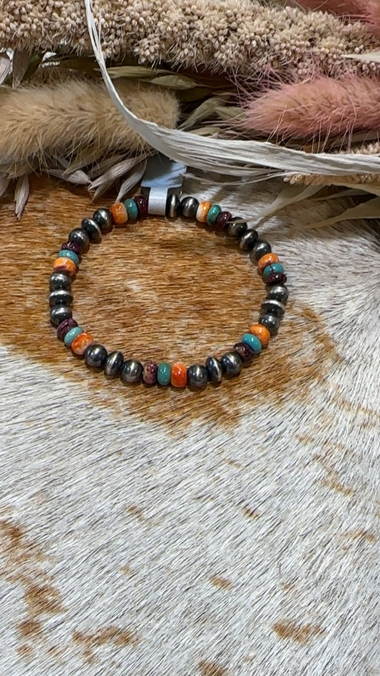 Authentic Sterling Silver Navajo Pearl Mixed Bead bracelet with multicolor Stone accents. Featuring the kingman turquoise, orange and red spiney oyster, red coral, purple spiney oyster(matching necklace available also).