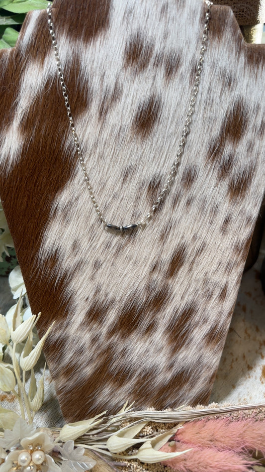 Sterling chain necklace with Navajo Pearl bead pendant.