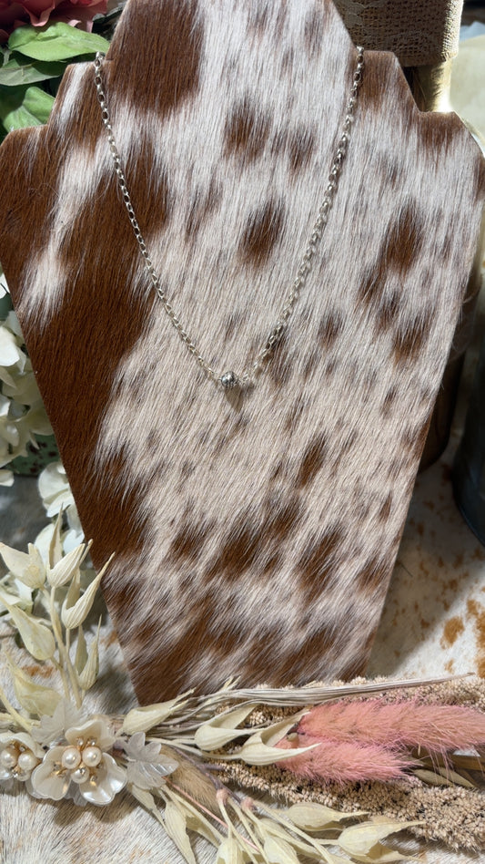 Sterling chain with a melon bead ornament with a squash blossom bead.